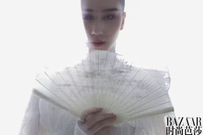 刘诗诗产后首登封面 以扇遮面英气十足